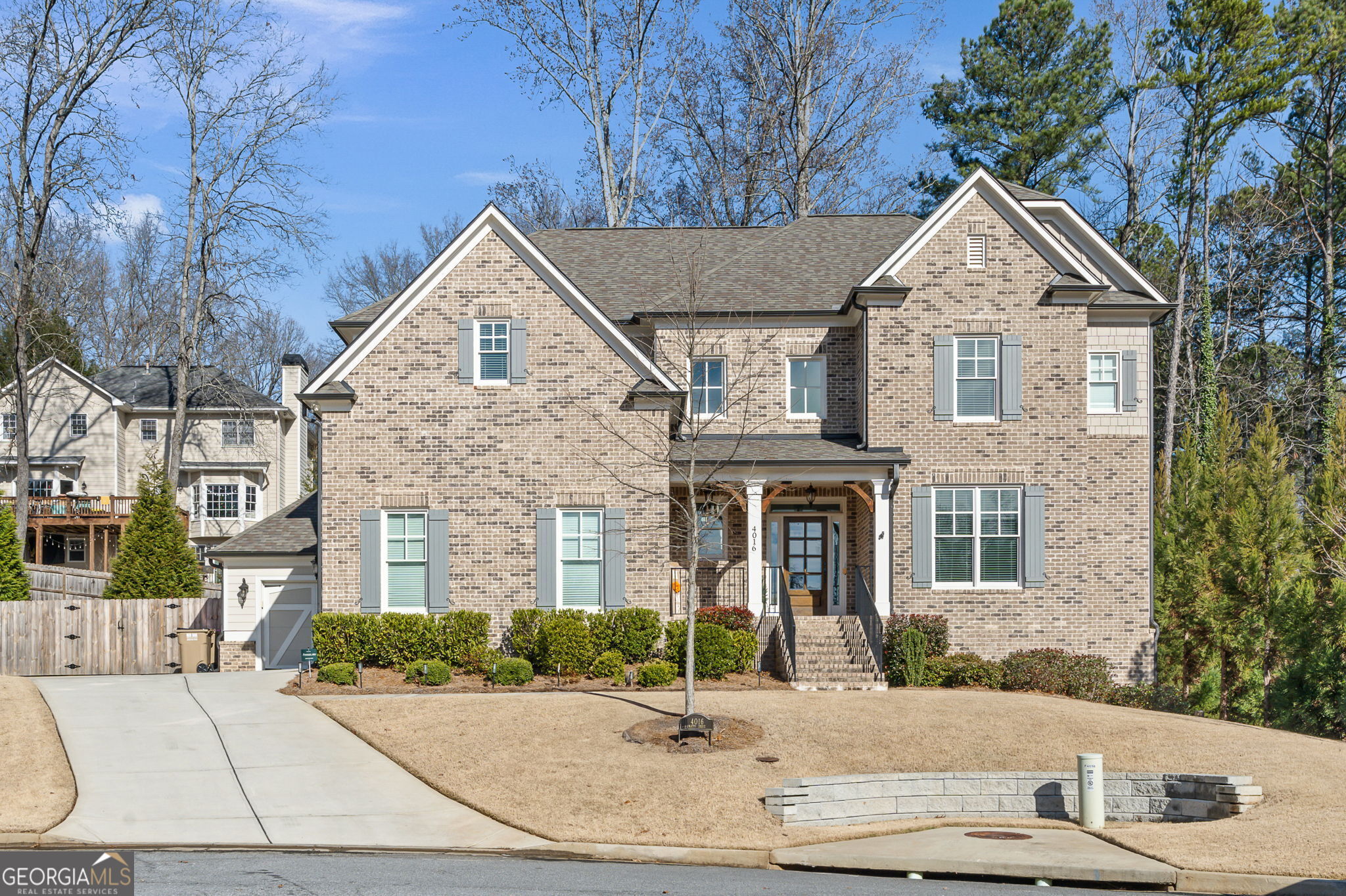 Nestled on a peaceful cul-de-sac in the highly sought-after Princeton Grove neighborhood of Marietta, this exceptional brick home has it all! The heart of the home is the gourmet island kitchen, which opens to a cozy family room and a bright breakfast area. A private main-level bedroom adds flexibility and convenience. Upstairs, you'll find a luxurious primary suite with spa-like amenities, Jack-and-Jill bedrooms with walk-in closets, a fifth bedroom with its own bath, a spacious media room, and a versatile loft - perfect for work or play. Step outside to enjoy the expansive deck, featuring a covered area with a fireplace, overlooking a fenced-in backyard - ideal for gatherings or relaxing evenings. The full daylight basement provides endless possibilities for customization. This home is a true gem, offering the perfect blend of style, comfort, and functionality. Don't miss your chance to make it yours!