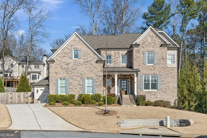 Nestled on a peaceful cul-de-sac in the highly sought-after Princeton Grove neighborhood of Marietta, this exceptional brick home has it all! The heart of the home is the gourmet island kitchen, which opens to a cozy family room and a bright breakfast area. A private main-level bedroom adds flexibility and convenience. Upstairs, you'll find a luxurious primary suite with spa-like amenities, Jack-and-Jill bedrooms with walk-in closets, a fifth bedroom with its own bath, a spacious media room, and a versatile loft - perfect for work or play. Step outside to enjoy the expansive deck, featuring a covered area with a fireplace, overlooking a fenced-in backyard - ideal for gatherings or relaxing evenings. The full daylight basement provides endless possibilities for customization. This home is a true gem, offering the perfect blend of style, comfort, and functionality. Don't miss your chance to make it yours!