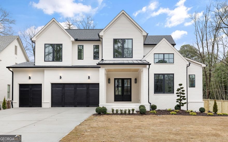 Welcome to an exceptional residence situated on a half-acre lot, featuring an unfinished basement, a 3-car garage, and a sprawling backyard. With 5 bedrooms and an impressive powder room, this masterpiece redefines elegance and luxury. Upon entering, custom steel and glass doors lead you into a grand great room where the seamless flow of space radiates style and serenity. The kitchen showcases custom cabinetry with high-end hardware, harmonizing perfectly with quartz countertops and a top-of-the-line appliance package, catering to both gourmet meals and casual relaxation. Convenience is key with a guest suite on the first level, while upstairs, the spacious primary suite beckons you to unwind in its magazine-worthy bathroom, complete with a freestanding soaking tub and rain shower. Thoughtfully designed secondary bedrooms and baths ensure comfort and sophistication. Nestled in sought-after Brookhaven, this superb location offers proximity to schools, restaurants, and premier shopping destinations. Step outside to the beautifully manicured green backyard, seamlessly connected to the main level. Every aspect of this home has been meticulously crafted for unparalleled luxury living.