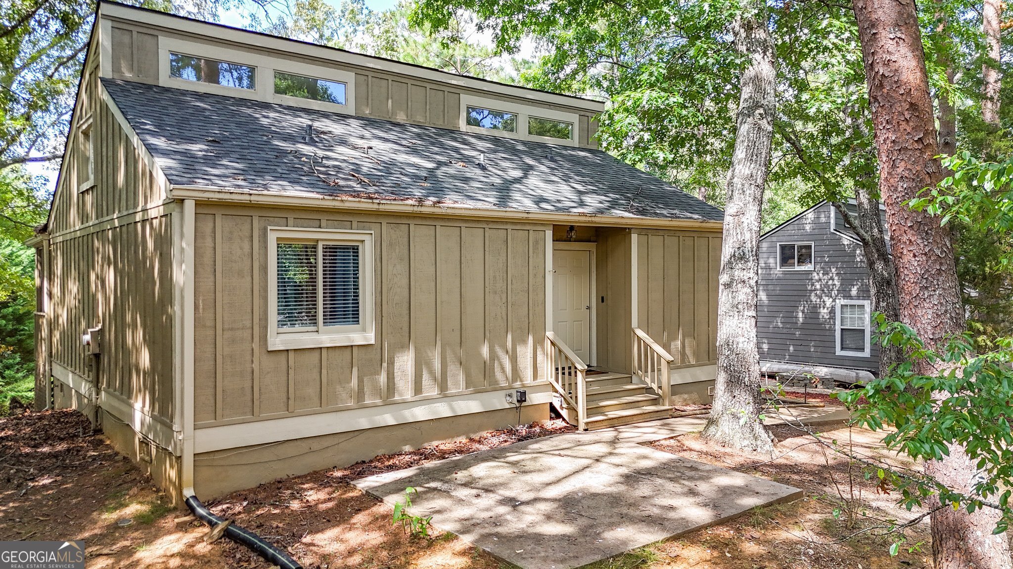 Welcome to 137 Narrows Loop - where thoughtful design meets exceptional quality in the heart of Lake Arrowhead, GA. Meticulously renovated from top to bottom, this stunning 2-bedroom, 2-bath home with a spacious sleeping loft offers a seamless blend of modern elegance and comfortable living-perfectly situated to take advantage of seasonal lake views. Step into a bright, open-concept interior featuring designer selections throughout, from exquisite flooring and stylish lighting to sleek contemporary finishes. The primary suite with spa-like en-suite bathroom exceeds expectations in both luxury and comfort. The chef-inspired kitchen is a true showpiece, appointed with granite countertops, upgraded appliances, and abundant space for cooking and entertaining. Nestled in Lake Arrowhead, a gated, mountain-lake-golf community in Cherokee County. Here you will find a clubhouse, tennis & pickleball courts, two swimming pools, 8+ miles of hiking trails, and multiple parks including Lakeside & Red Cloud, 24-hour gated security, community clubhouse, chapel, and fire department. This property is more than just a home-it's an income-producing gem, designed by the owner for personal enjoyment first and foremost. Whether you're looking for a primary residence, a serene second home, or a proven rental investment, 137 Narrows Loop is turnkey, versatile, and ready to impress.