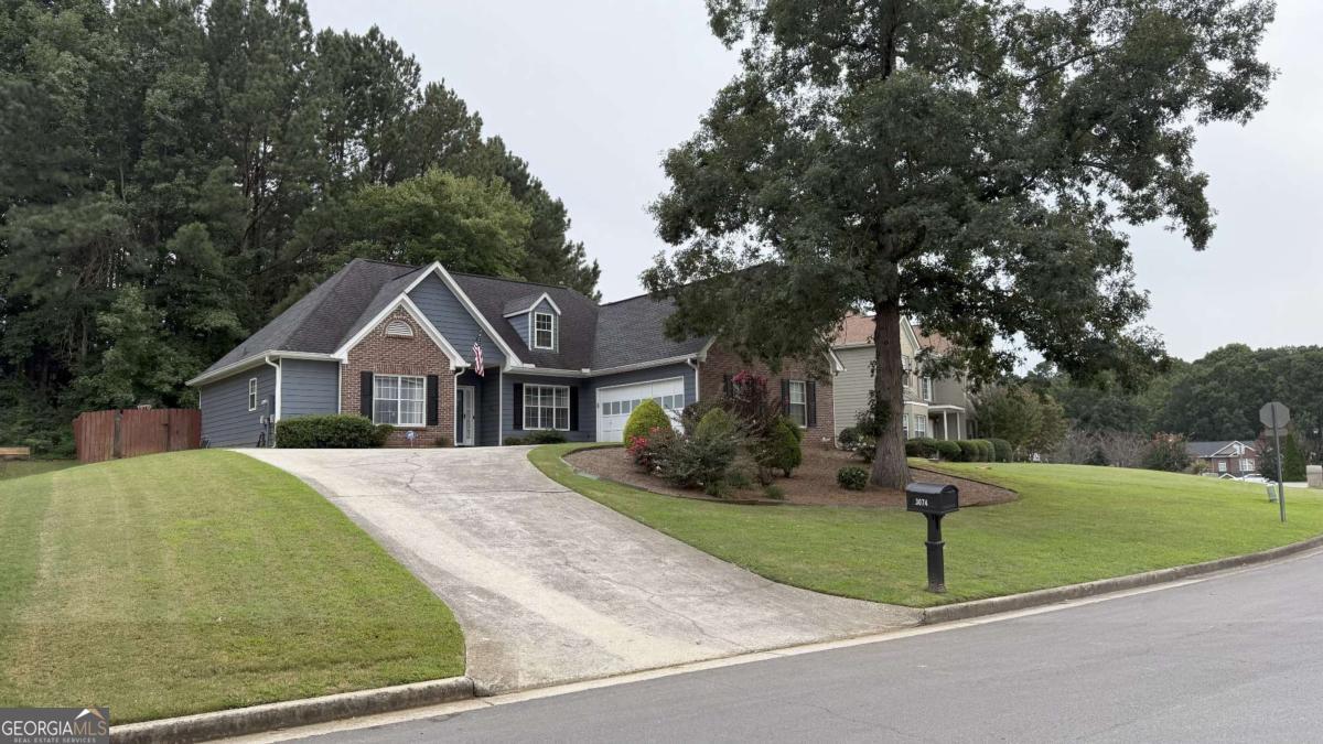 Do not miss this beautiful ranch style home in Collins Hill district! Large open living room with Hardwood floor throughout. Separate dining room. Kitchen features stainless steel appliances New microwave, New Dishwasher, Pantry.... Fenced in backyard (rod fence on 3rd side). Roommate floorplan features two bedrooms on one side with shared hall bath w/ dual vanities, tub shower combo. Master bedroom features 9 foot ceilings; master bath with dual vanity, granite counter-tops, separate tub and shower, walk in closet. Additional bedroom upstairs. New roof and water heater. Move in ready!