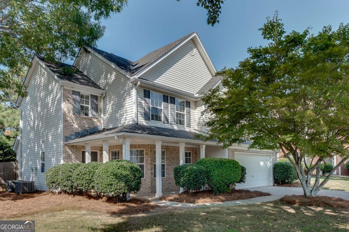 Nestled on a level, fenced, cul-de-sac lot in the highly sought-after Old Suwanee Crossing community, this beautiful and meticulously maintained home offers the perfect blend of comfort and convenience. The main level boasts a bright white kitchen with newer stainless steel appliances, open to a cozy fireside family room-ideal for everyday living and entertaining. You'll also find a separate office/living room and a formal dining room, all accented by stunning wide-planked European French oak engineered hardwood floors. Upstairs, the spacious primary suite features a custom-built closet system, while three generously sized secondary bedrooms share a full bath. Step outside to your own piece of paradise! Plenty of room for gardening, a play area or anything you desire. Freshly painted and move-in ready, this home is located just minutes from I-85, top-rated Gwinnett County schools, and fantastic HOA amenities, including swim and tennis. Don't miss this opportunity to live in one of Suwanee's most desirable neighborhoods!
