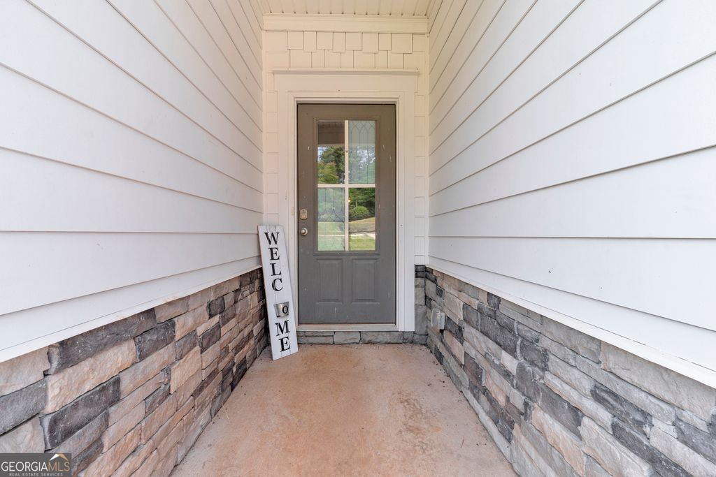 Photo of 165 Woodpecker Pointe, Danielsville, GA 30633 (MLS # 10766660)