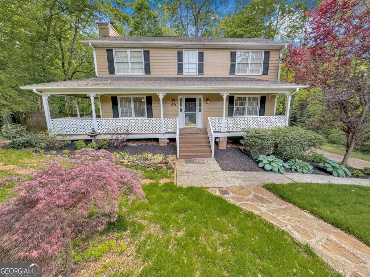 Available July 14! Gorgeous 3 BR/2 BA Traditional in Marietta! Wrap-around front porch with swing, hardwood floors, fresh paint, new fixtures and cozy fireplace in the master bedroom add to the charm of this lovely home nestled deep in the Falcon Crest subdivision on a cul-de-sac lot. Formal dining room, kitchen with stainless appliances, granite countertops, tile backsplash, pantry and breakfast area with access to back deck overlooking fenced backyard. Family room with fireplace and half bath complete the main level. Upstairs is an oversized master with ensuite bath and large walk-in closet, two additional bedrooms with hall bath and convenient laundry closet. Partially finished basement features a flex space that can be used as an office or for recreation. 2 car garage. Lassiter High School! Convenient to shopping, restaurants, Roswell, Woodstock and more! Resident Benefit Package included. Check out our 5-Star Reviews on Google. Rent quoted reflects discount for on time payment, ask for details.