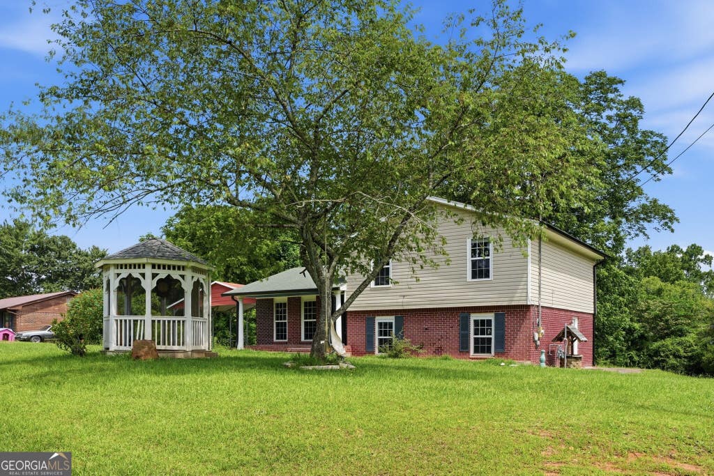 Photo of 420 Henson Circle, Carrollton, GA 30117 (MLS # 10786456)