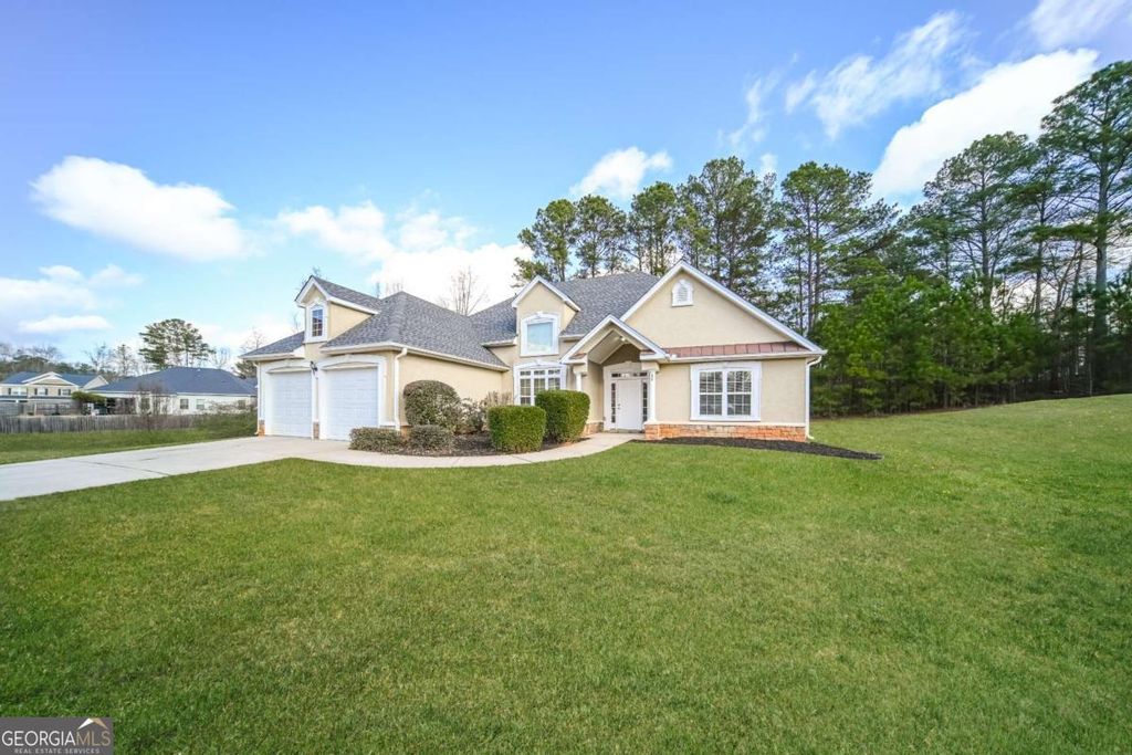 Photo of 80 Knolls Ridge, Hampton, GA 30228 (MLS # 10677878)