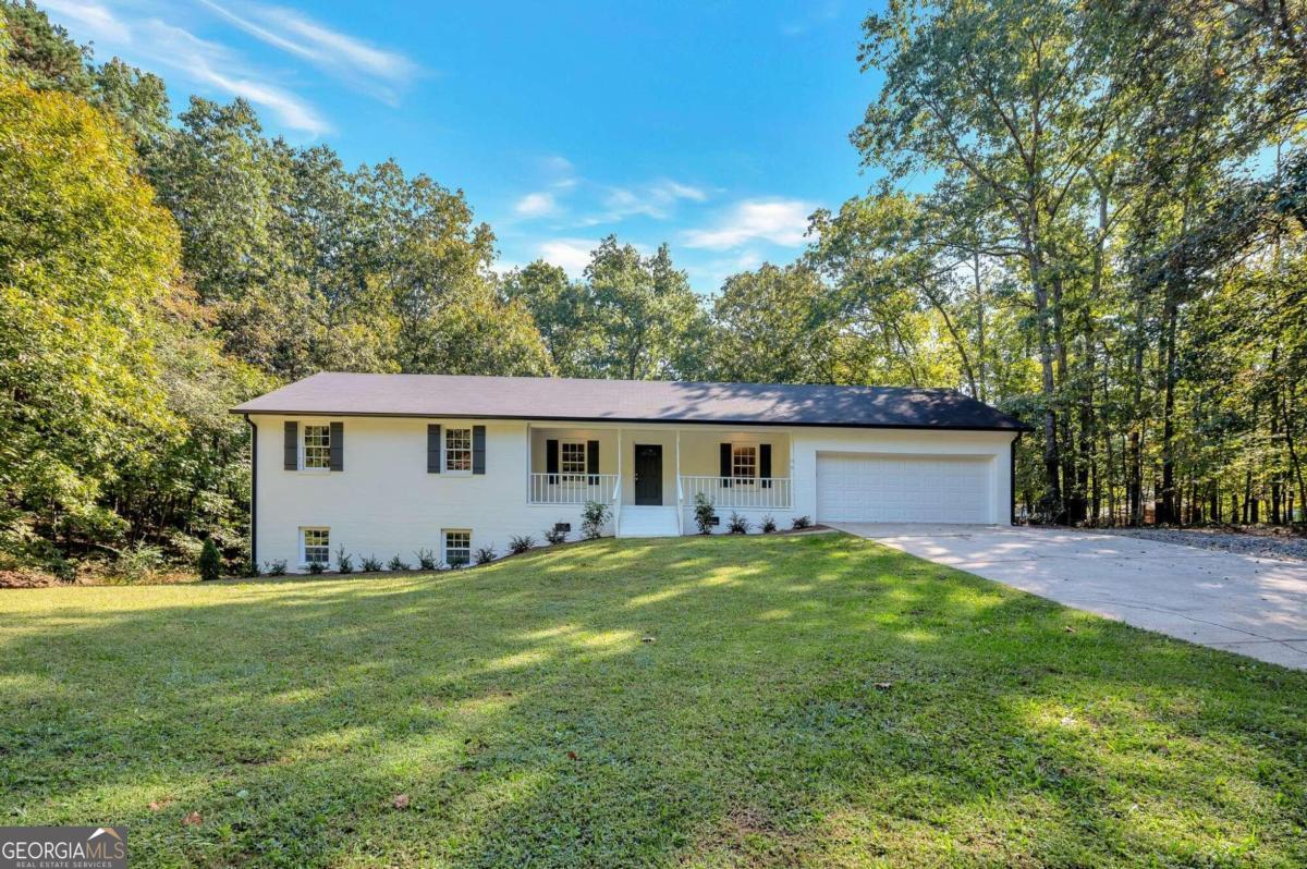 Beautiful brick ranch home on nearly 1 full acre in peaceful Silver Creek. 4-bedroom, 2 full bath ranch floor plan with finished basement, and attached 2 car garage. Many recent updates including Stainless steel appliances, new HVAC, new flooring, new paint, new fixtures, granite countertops, and much more. Spacious, and private yard, covered front porch, and covered rear deck. Great location!