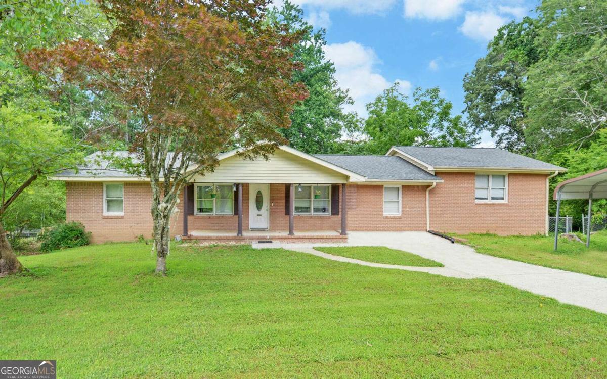 Welcome to this spacious 4-bedroom, 2.5-bathroom home that offers plenty of room for your family to grow! The large backyard is perfect for children and pets to play safely, as it's fully fenced for added security. You'll also appreciate the huge workshop in the backyard, which comes equipped with power-perfect for hobbies or extra storage. Situated in a quiet neighborhood, this home provides a peaceful retreat while still being conveniently located near local amenities. Don't miss your chance to make this wonderful property your own!