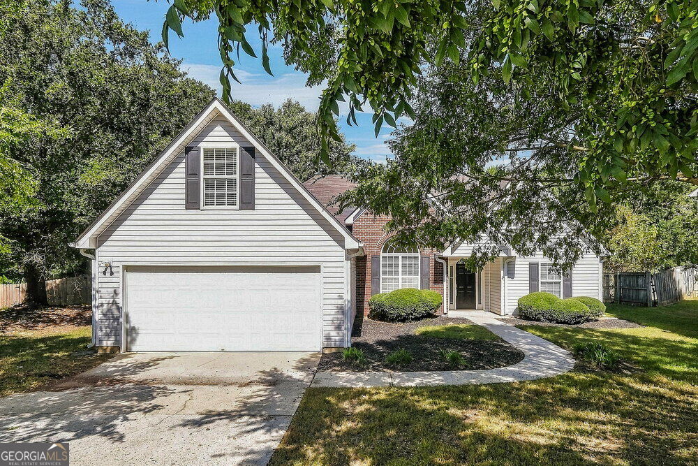 Photo of 465 Aristocrat Drive, Loganville, GA 30052 (MLS # 10880404)