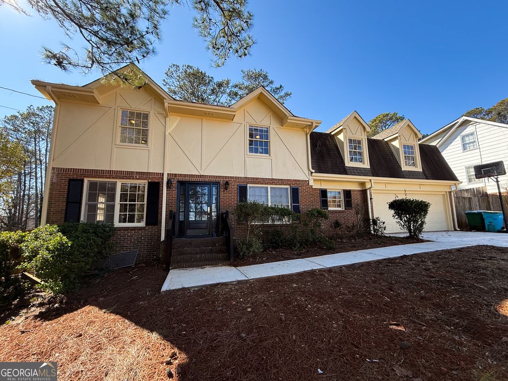 Photo of 1675 Lake Lucerne Road SW, Lilburn, GA 30047 (MLS # 10696008)