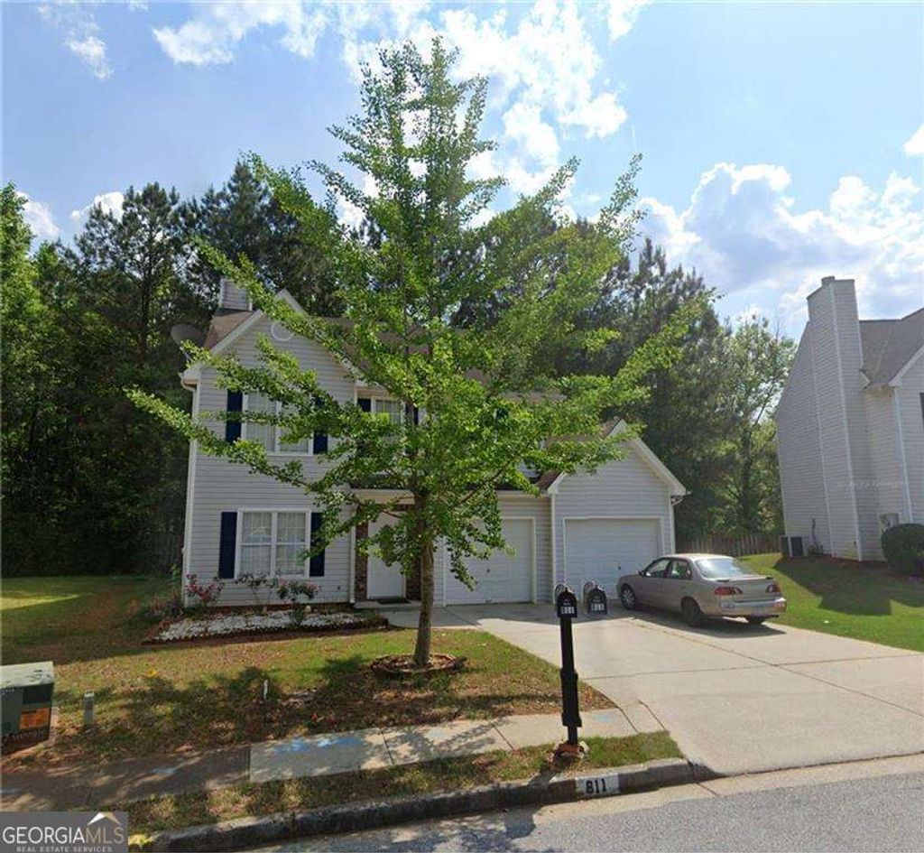 Photo of 811 Sugar Oak Lane, Lawrenceville, GA 30043 (MLS # 10736223)
