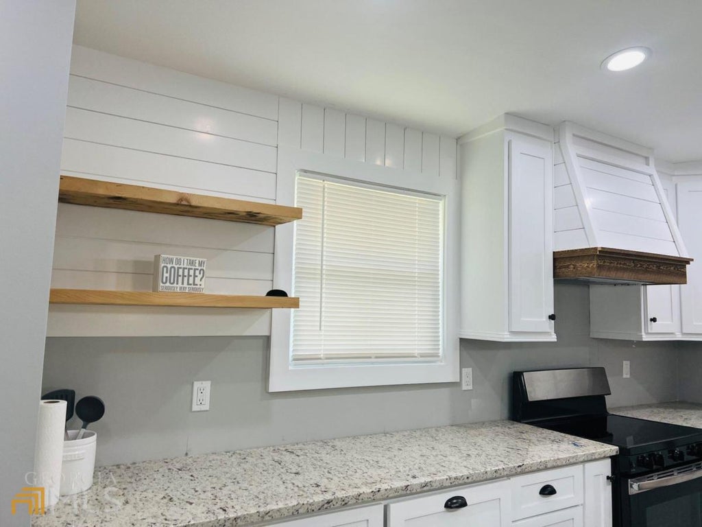 Photo of 4310 Bouldercrest Road, Ellenwood, GA 30294 (MLS # 10839793)