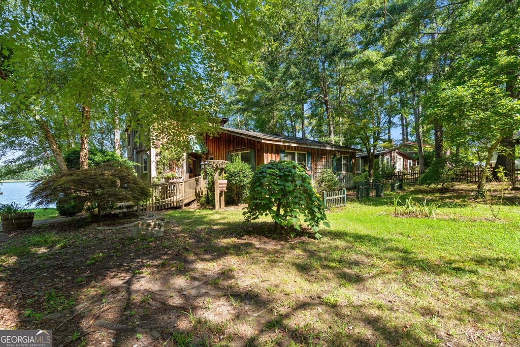 Photo of 30 Peachtree Drive, Sharpsburg, GA 30277 (MLS # 10828229)