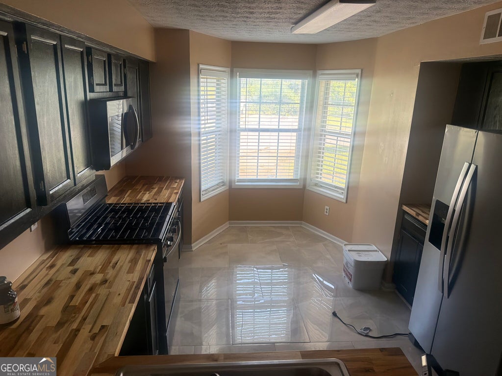 Photo of 9472 Cypress Lane, Jonesboro, GA 30238 (MLS # 10872282)