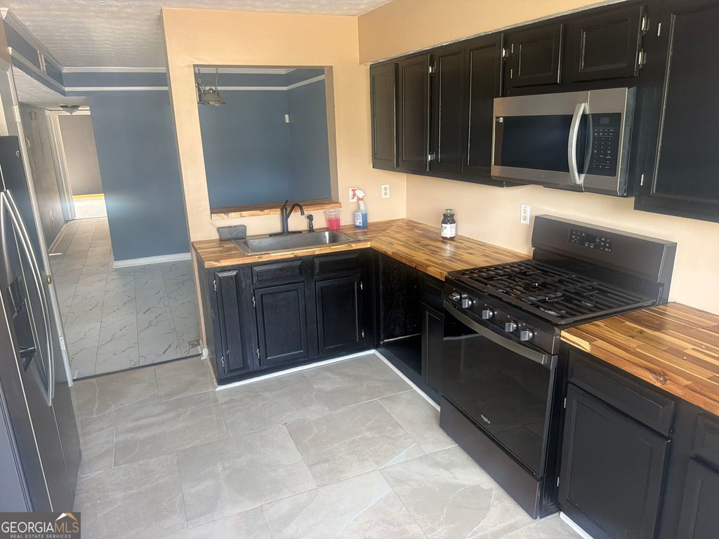 Photo of 9472 Cypress Lane, Jonesboro, GA 30238 (MLS # 10872282)