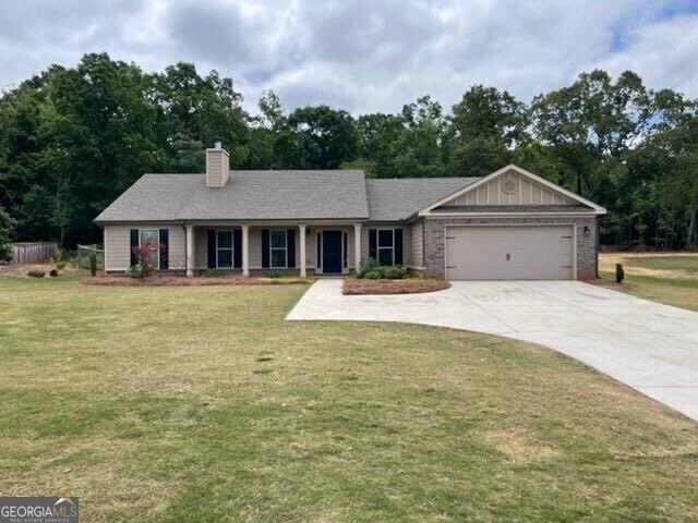 This home has everything you've been looking for! Located just 10 minutes from the University of Georgia, you'll love the convenience and charm of this exceptional property. Step inside to a spacious open floor plan featuring four oversized bedrooms and three full baths-all on one level. Perfect for entertaining or everyday living, the layout offers seamless flow from the living area to the heart of the home: a gourmet kitchen with a large island, granite countertops, and nearby laundry room. Enjoy peaceful mornings on the back porch, or host friends and family on the covered patio overlooking a spacious fenced backyard-ideal for outdoor fun. A two-car garage adds convenience, and with NO HOA, you'll enjoy the freedom to make this home your own.