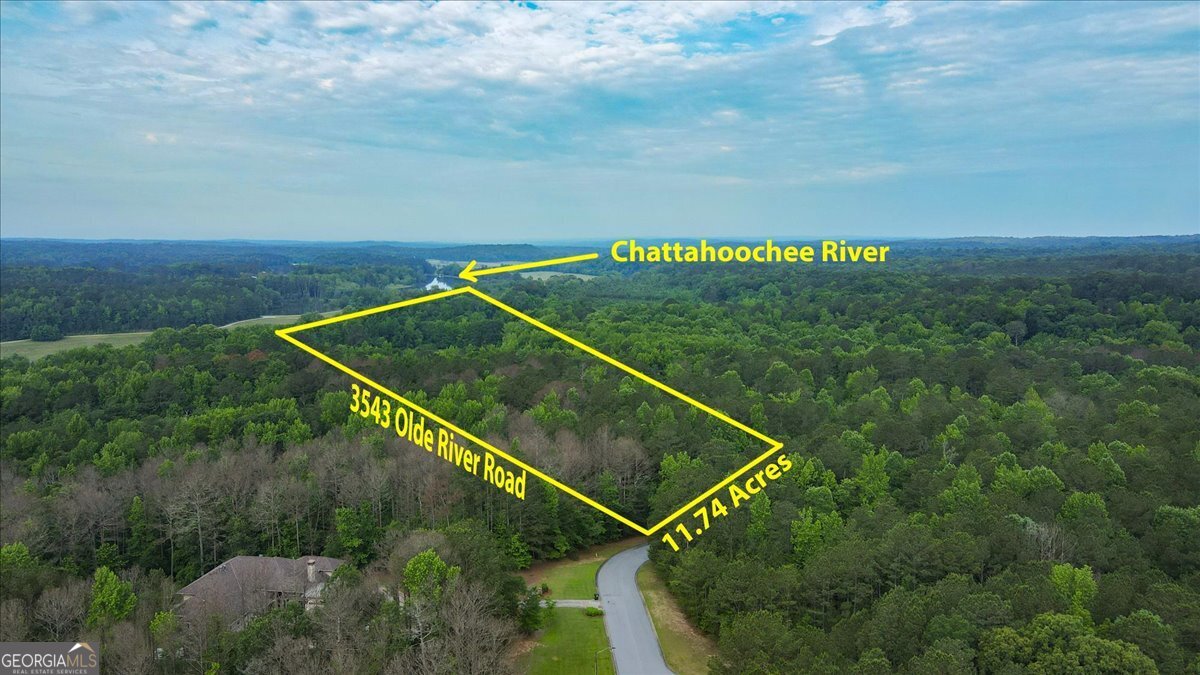 Escape to the tranquility of the countryside and discover a haven of peace on the Chattahoochee River. With your vision and the expertise of your builder, craft the perfect retreat amidst the charm of this wooded estate within the esteemed Olde River Plantation community. Spanning just over 11.74 +/- acres, embrace boundless opportunities to create your ideal home, surrounded by lush privacy. Easy access to HWY 92, Chapel Hill Road, and HWY 5 offers a simple route to I-20, Arbor Place Mall, the Atlanta Airport, as well as Lions Gate Studios.