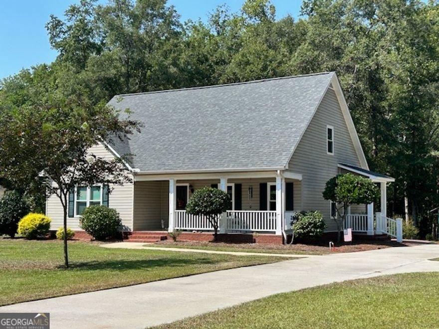 This home sits on 1.732 acres w/private back yard. This home features 3bedrooms 2.5 baths w/the master suite being downstairs. Master suite w/wood floors, walk-in closet, granite in bathroom, shower with seat. Family room w/wood floors & electric fireplace. Kitchen opens to dining area with undermount lights, oak cabinets, granite countertops, breakfast bar, all appliances stay, pantry, & extra storage under the stairs. Back foyer makes easy access to office w/ wood floors, built-in desk & bookshelves. Upstairs has 2 bedrooms 1 bath and a den area not to mention walk-in closets & attic access. Updated screened porch w/freshly painted floors w/access to brick patio. Concrete driveway w/circle drive & 20x24 new parking pad that is covered. 12x16 shop on concrete pad, electricity, & double doors for easy entry for lawn mower. Wooded lot that goes back to the creek. Covered front porch as well as separate siting area on side yard. New energy efficient windows. Water purification system