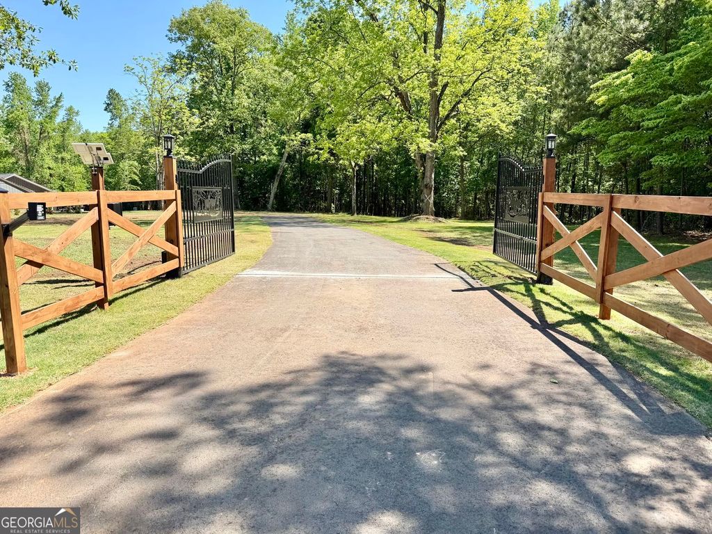 Photo of 7300 Rivertown Road, Fairburn, GA 30213 (MLS # 10737938)