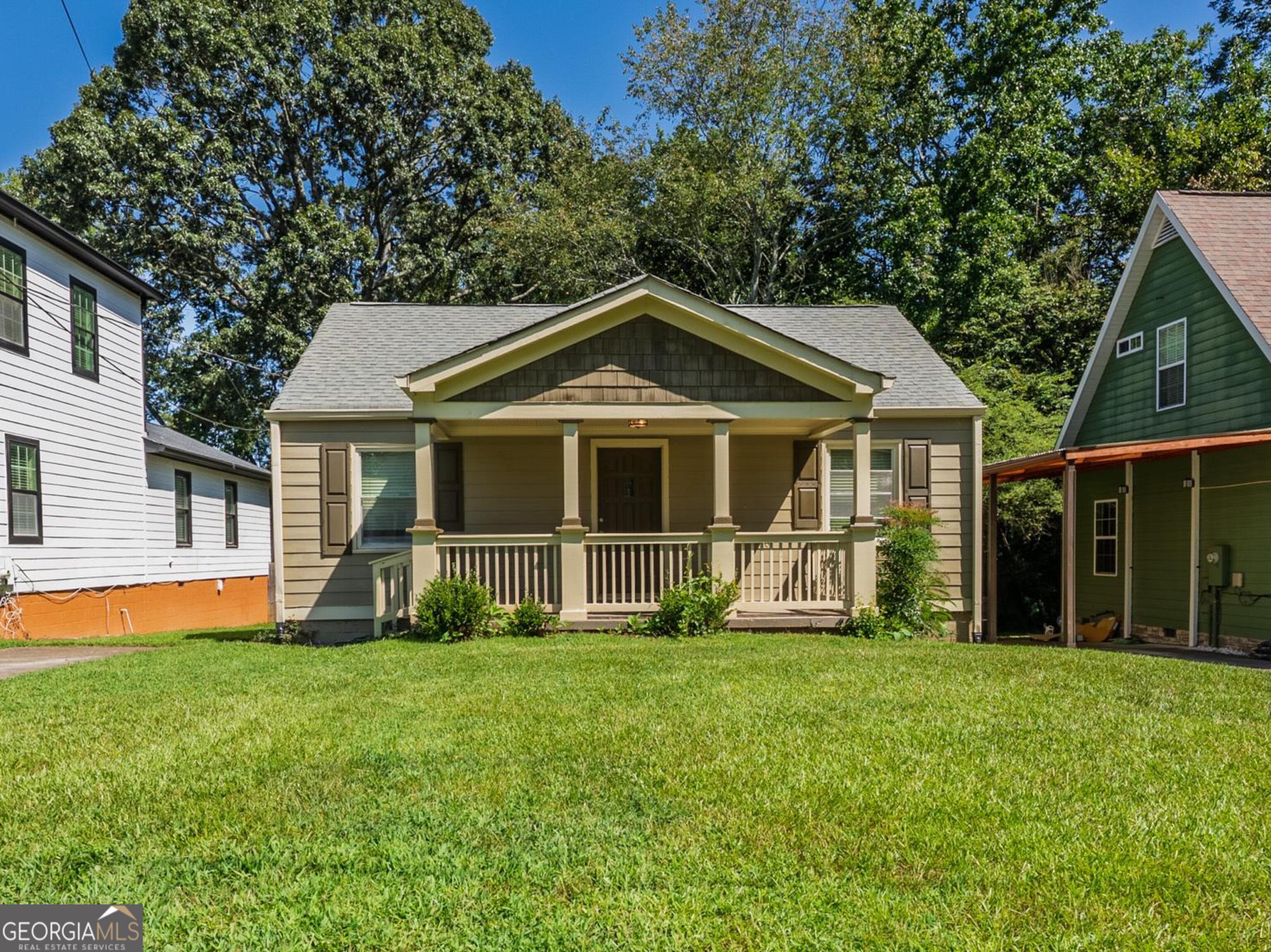 Welcome to 1411 Mercer Ave - Your Move-In Ready Home or Turnkey Investment with No HOA! This beautifully renovated home offers the perfect blend of comfort, convenience, and opportunity. Located just minutes from Atlanta's Hartsfield-Jackson Airport, it's an ideal choice for families seeking a prime location or investors looking for a profitable Pad Split or Crash Pad setup. Step inside to find refinished hardwood floors that flow seamlessly throughout, creating a warm and inviting atmosphere. The home features 3 bedrooms and 2 full bathrooms and has been thoughtfully updated to provide modern comforts while maintaining its classic charm. The deck and private backyard are great for entertaining or creating your own oasis. Families will appreciate being only blocks from the prestigious Woodward Academy, one of the area's most distinguished schools. Enjoy a layout that's perfect for everyday living, entertaining, or future rental income potential. The possibilities are endless! Whether you're envisioning your next family home or a smart investment property, 1411 Mercer Ave is ready for you.