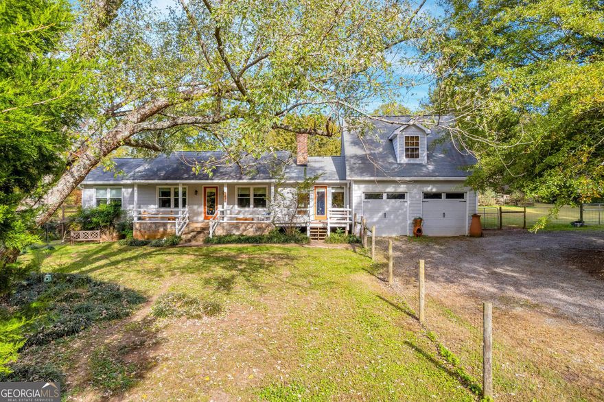 Remodeled farmhouse fenced and cross-fenced for your horses - and ALL of your animal friends! This home features 4 bedrooms and 4 full baths including two master suites and teen suite upstairs. Eat-in kitchen includes stainless steel appliances, granite counter tops, gas stove, walk-in pantry and back kitchen area w/ additional sink, wine refrigerator, and storage for small appliances. Recent renovations include new windows and exterior doors, new water heater, new HVAC systems, added natural gas hookups, installed automatic natural gas generator that runs entire property, new light fixtures/fans, etc. Go outside to the back deck, above ground pool, koi pond, pool shed, a barn with attached 2 oversized stalls, pond and pastures w/ paddock, separately fenced raised bed garden, and 20' x 50' chicken coop with electricity and water. Enjoy a fresh harvest from established persimmon trees, pear trees, blueberry bushes, and pecan trees. There is adequate acreage and road frontage to subdivide the property and build another home on the property AFTER SALE if desired.