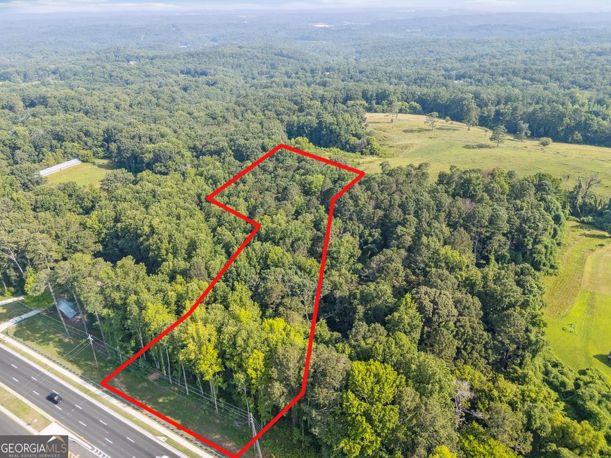 Prime 3.29-Acre Commercial Lot on Hwy 20 - Canton, GA. Unlock the full potential of your business vision with this exceptional 3.29-acre parcel located directly on bustling Hwy 20 in Canton, Georgia. Zoned General Commercial (GC), this high-visibility property offers outstanding development opportunities for a wide range of uses, including retail, office, medical, hospitality, or mixed-use ventures.  Situated in one of Cherokee County's fastest-growing corridors, the site benefits from excellent frontage and traffic exposure, with easy access to I-575 and the thriving commercial and residential developments surrounding the area.    Property Highlights:    3.29 acres of high-exposure commercial land    Zoned General Commercial (GC)    Located on heavily traveled Hwy 20 (Cumming Hwy)    Minutes from downtown Canton and I-575    Surrounded by established and emerging residential communities, national retailers, and local businesses    Ideal for retail center, medical offices, or service-based business    Don't miss this rare opportunity to secure a strategic commercial site in one of North Metro Atlanta's most desirable and rapidly expanding markets.