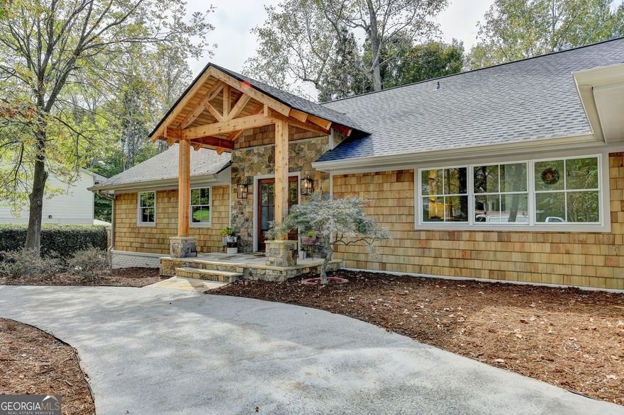 New Build 2025 - Completely reimagined from the studs of a 1971 home.  Relax on 6-acre lot- private lake dock. Designed by Architect with combined skills of structural engineer.  Quality construction with attention to detail. Created for a rare one level living if desired.  Oversize master on main- enjoy coffee on screen porch overlooking Kinglsey Lake. Second master/bedroom option on main.  Upper level 2 bedrooms for office or quests - full bath and storage. Open floor plan includes vaulted ceilings. Finished terrace level perfect in-law, au-pair or student suite. Stubbed for second kitchen. Separate entrance. Wrap around decks. Nature lovers' and gardener's paradise. Canoe over to renovated Kingsley swim/tennis club. Firepit -Interior boosts high end appliances- Chef's kitchen - 5" oak hardwoods throughout. River Stone fireplace - All permitted and approved. Surveyed. Developed with vision for strong buyer. All this plus on a quiet cul-de-sac and friendly walkable neighborhood. Hard to find and won't last. Use showing time - Seller is listing agent.