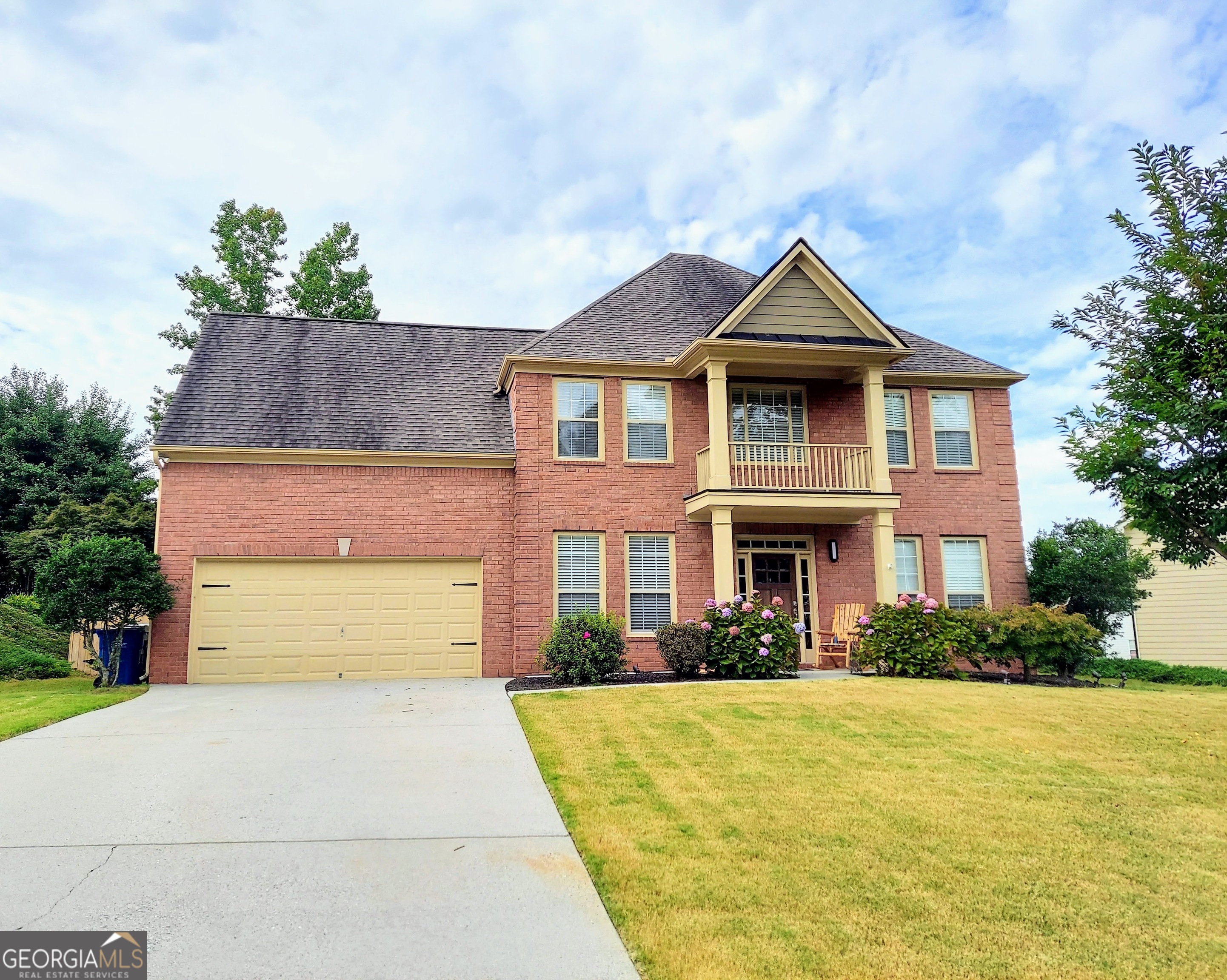 Move right in this well upgraded and decorated home. Easy maintenance Brick & Hardy plank siding, NEW AC units (two). No carpet in this house, easy clean hardwood, slate, tile, LVP flooring. Just 2.6 miles from I-85 will get you home quicker. Enjoy the fenced backyard on the oversized wooden deck n/patio. Tired of grilling on the deck? No worries Chef's Delight kitchen awaits, ample storage, 40 inch cabinets, granite countertops, raised bar countertop, island, breakfast table areas seats six w/ lots of sunlight while overlooking the fireside family room. Large Master Suite has an extra sitting room, large walk-in closet, tiled master shower with glass doors n/frame, double sinks and soaking tub. Laundry room has easy access for the 4 bedrooms on the upper level. The french glass door room is currently being used as a 5th bedroom but can easily switch back to an office. Community offering swimming pool, tennis, pickleball courts, playground, community pond, sidewalks and street lights.