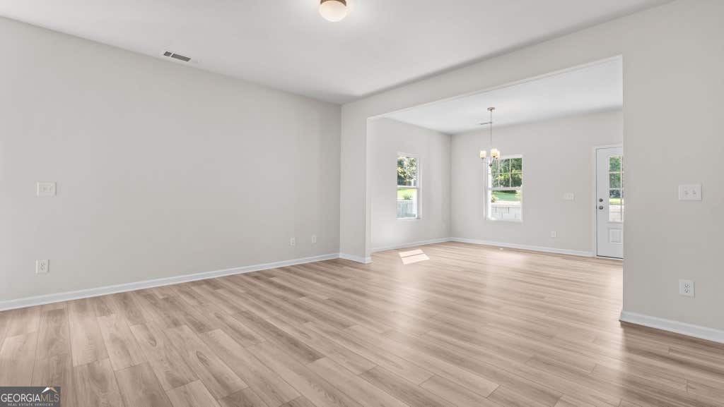 Photo of 5245 Gainesville Street, Flowery Branch, GA 30542 (MLS # 10822179)