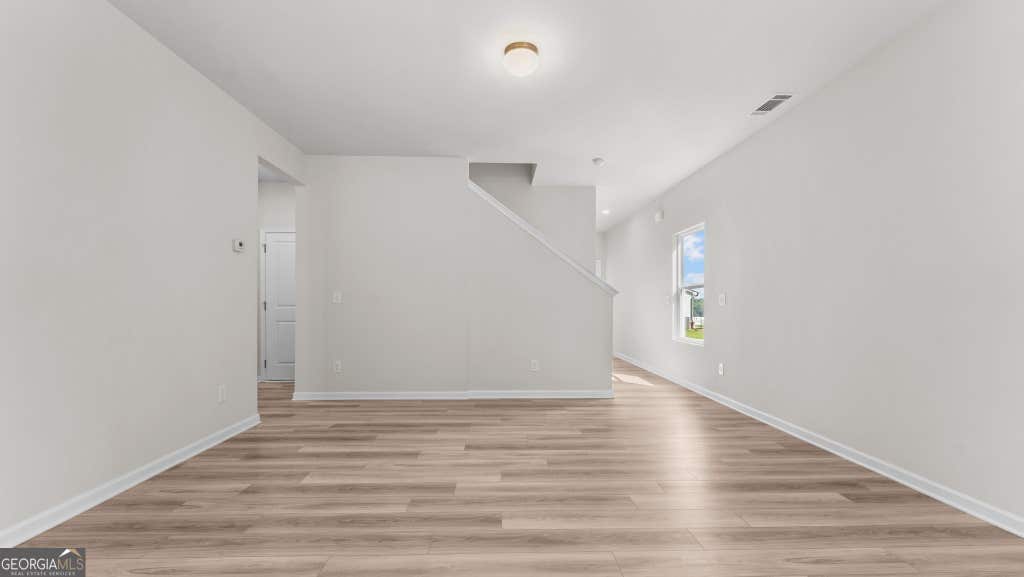 Photo of 5245 Gainesville Street, Flowery Branch, GA 30542 (MLS # 10822179)