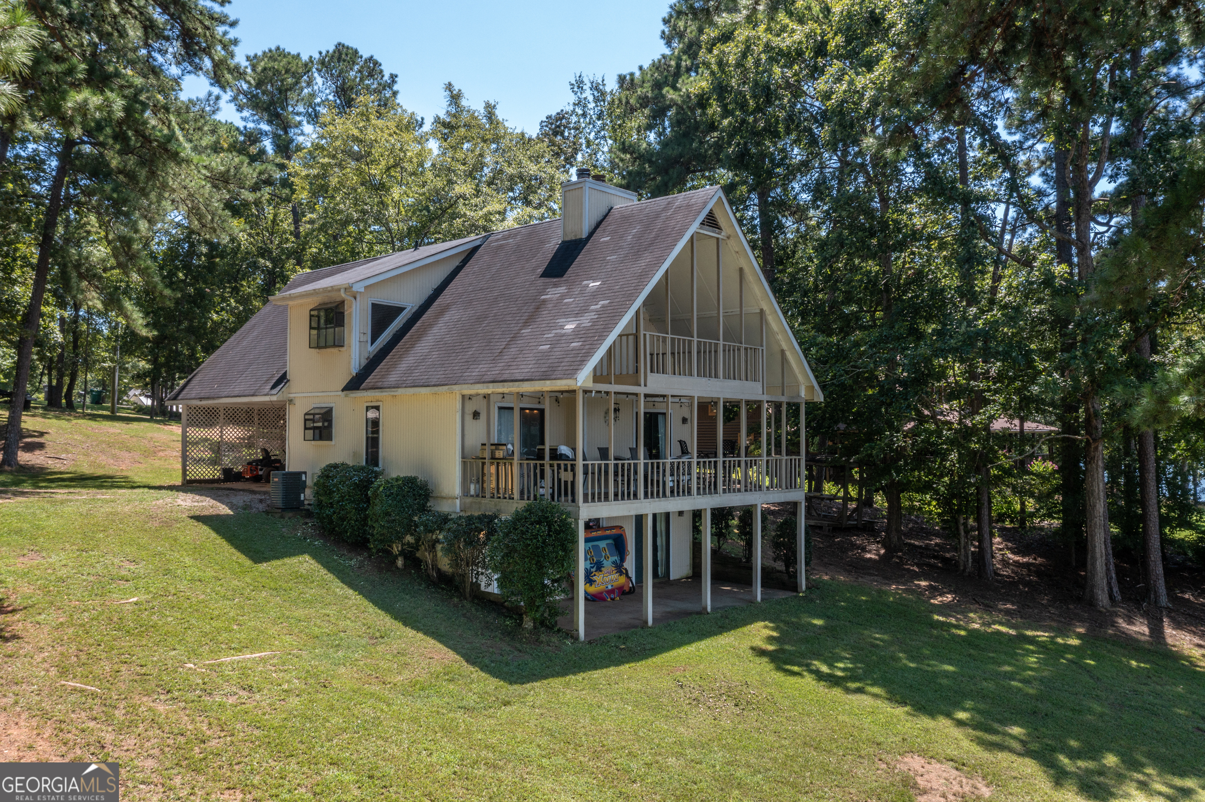 This property offers one of the more exceptional waterfront lots on Lake Oconee. An exceptional opportunity to reimagine or rebuild the waterfront property of your dreams. Prime Lakefront Lot, Over 250 sq ft of lake frontage. Max Dock Allowed. This lot can accommodate a Max Dock, giving you the best possible lake access and water recreation setup. Deep water at dock with stunning views. Panoramic lake views and epic sunsets. There are 2 beach accesses on this lot! Brand new seawall installed in 2025. Perfect for someone who values spectacular lake living, outdoor fun, and tranquility.