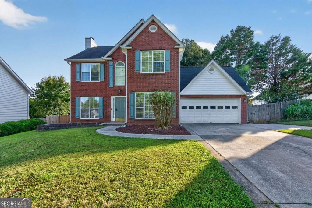 Photo of 915 Charter Club Dr, Lawrenceville, GA 30043 (MLS # 10846885)