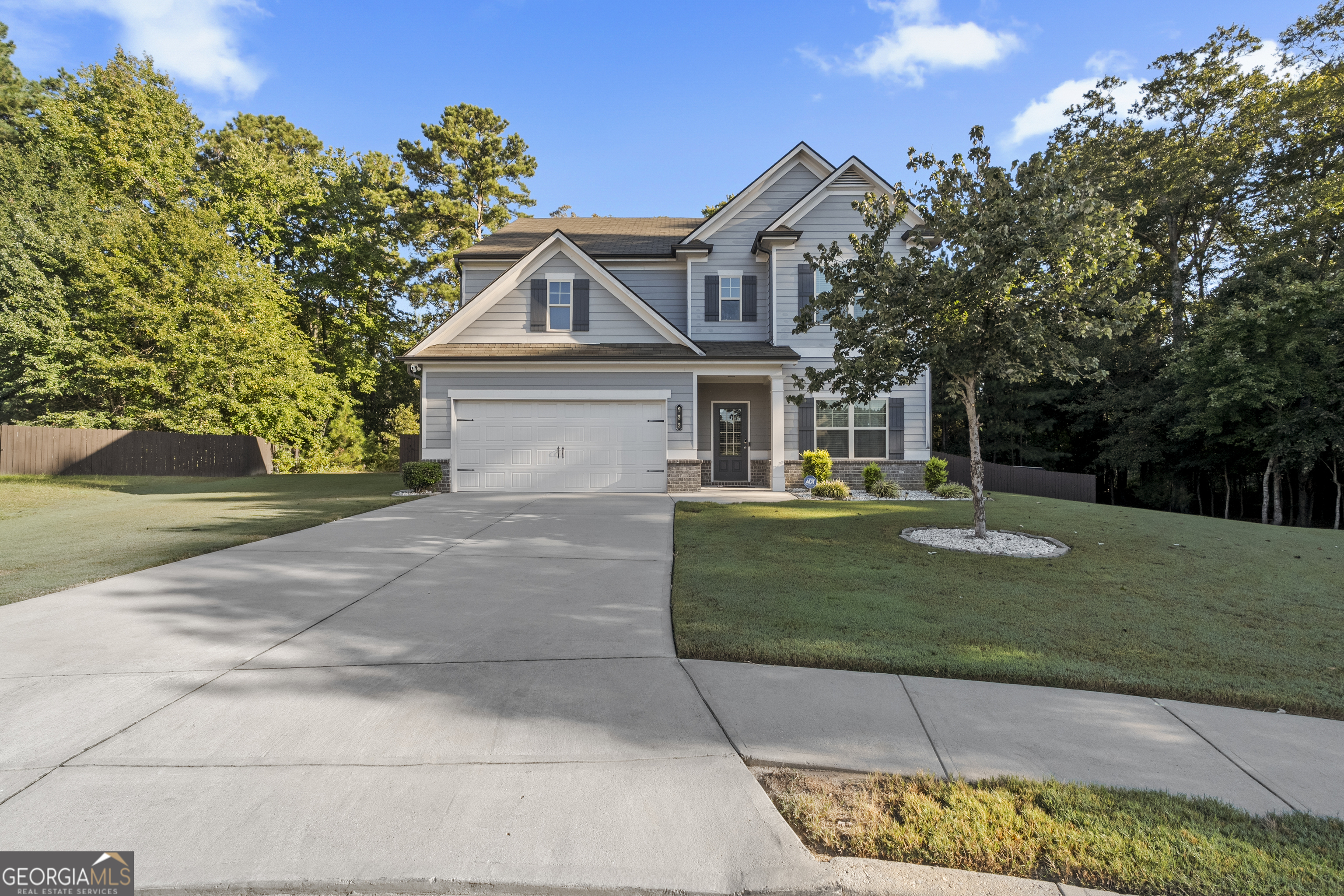 Step inside to find a spacious and inviting floor plan featuring two fireplaces, one in the enclosed patio deck and another in the family room. The elegant kitchen is a true centerpiece, complete with a large granite islands, matching granite countertops, and all stainless steel appliance in the heart beat of the home! This home provides elegance, comfort and location a great location and ideal choice for families looking to put down roots in a thriving up and coming community. Come and see this beautiful well kept home!