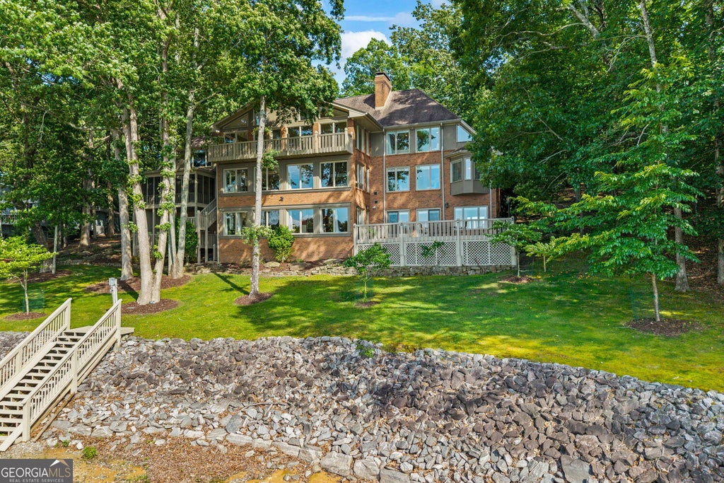 Photo of 6576 Yacht Club Road, Flowery Branch, GA 30542 (MLS # 10854059)