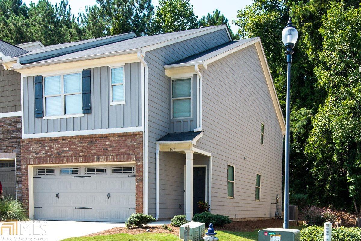 Welcome Home ! Must see beautiful end unit with open floor plan. Spacious kitchen with walk in pantry;Master with oversized walk in closet ,double vanity, separate shower and bath tub, 2 additional bedrooms with walk in closet /closet , Laundry upstairs,2 car garage with a driveway that can accommodate 2 additional vehicles. Private patio perfect for grilling and entertaining.Ideally located minutes to I-575,Downtown Woodstock,Shopping,Kennesaw University,Towne Lake and much more. Great school District !Owner is a Licensed Real Estate Agent