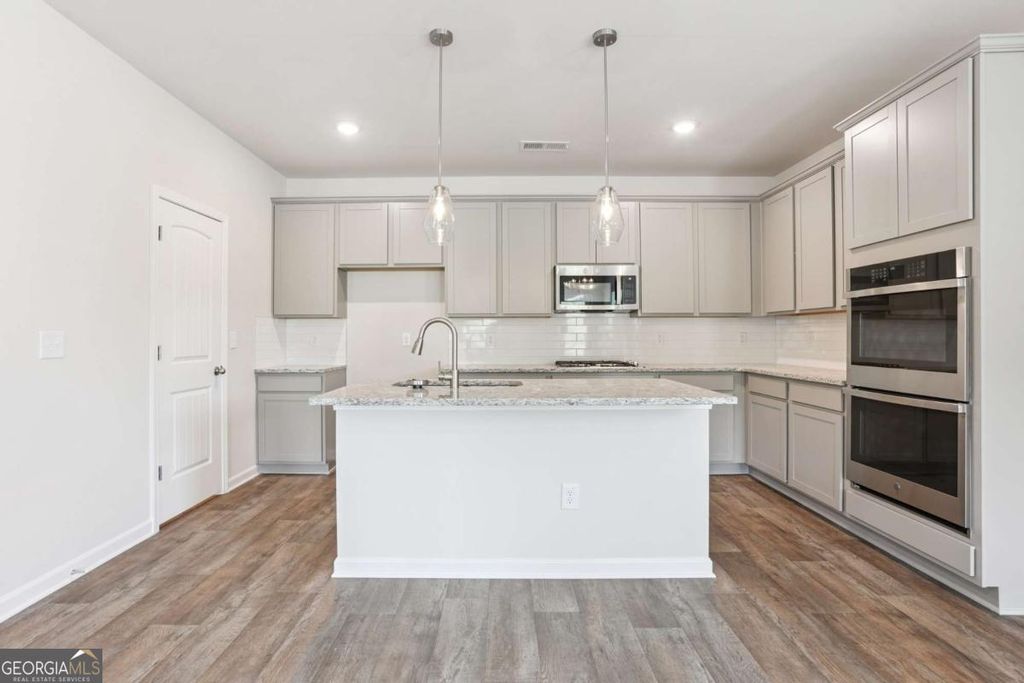 Photo of 33 Faulkner Circle, Social Circle, GA 30025 (MLS # 10756246)