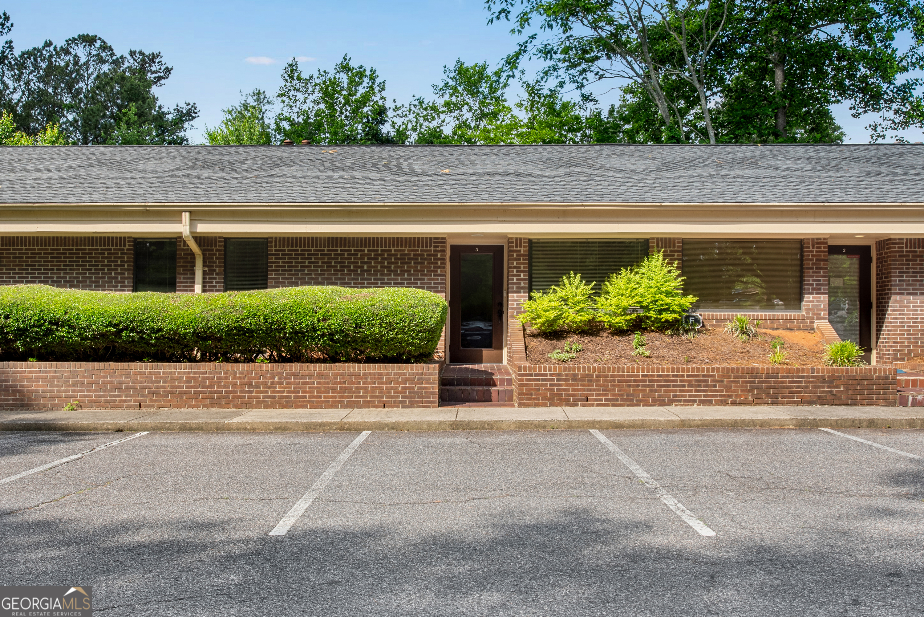Exceptional owner-user or investment opportunity in a high-visibility Alpharetta Highway retail/office strip! Formerly a thriving children's tutoring center (relocated to a larger space), this turnkey unit is ready for your business. Property Highlights: 4 Private Offices - Ideal for consultations, meetings, or focused work; 2 Full Bathrooms - Conveniently located for staff and clients; 1 Storage Room - Secure space for files, inventory, or supplies; Welcoming Reception Area - Perfect first-impression zone for welcoming clients; Versatile Layout - Easily adapts to professional services: real estate, insurance, therapy, accounting, and more; Prime Location on Alpharetta Hwy with excellent street frontage and signage opportunities; Ample Parking - Plenty of customer and staff spaces right out front. HOA $225 /monthly, includes water, landscaping , common area maintenance, roof maintenance , trash . Turnkey Condition - immediate occupancy! Strong Investment Potential - Owner-user or rental income prospect in a busy corridor.