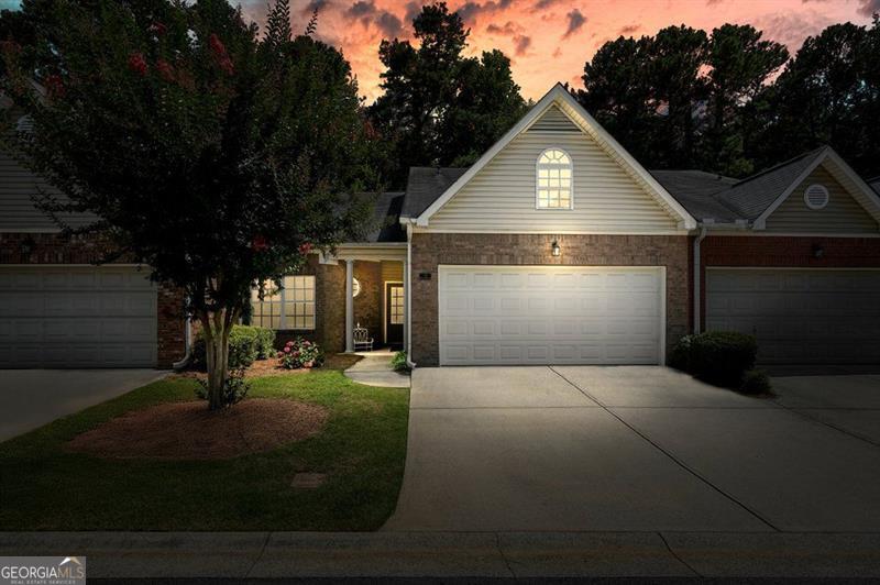 Gorgeous Move-In Ready True RANCH Home - No Stairs! Welcome to this beautifully maintained 2-bedroom, 2-bathroom ranch-style home, nestled in a peaceful, smaller community with only 38 homes and a prime central location! Step into the expansive foyer and family room, where soaring vaulted ceilings and rich hardwood floors create a warm and inviting atmosphere. The open-concept floorplan is perfect for comfortable living and entertaining. Enjoy meals in the elegant dining room featuring a beautifully crafted trey ceiling. The spacious kitchen offers a clear view into the family room, making it easy to stay connected with guests and family. The cozy breakfast room offers the perfect spot to enjoy your morning coffee. Just beyond, the sun-kissed sunroom-with its floor-to-ceiling windows-beautifully brings the outdoors in, creating a tranquil space to soak in the view of the natural backyard oasis. Step outside to a peaceful patio surrounded by mature trees and a lush green lawn, where you can unwind and listen to the soothing sounds of birdsong. A large laundry room adds convenience and functionality. Retreat to the oversized owner's suite, complete with a spacious spa-like ensuite bath featuring dual vanities and a large walk-in closet. The generous secondary bedroom and full bath are ideal for guests or a home office. The two-car garage includes attic storage for added space. Enjoy hassle-free living: The HOA covers exterior maintenance, landscaping, lawn care, water, sewer, termite control, trash pickup and common area maintenance -making this truly low-maintenance living at its best. A brand-new roof is being installed this month, and a new water heater and HVAC have been recently added as well as extra-thick, energy-efficient insulation in the attic. Master association fee is a one-time fee at closing. Tucked away at the end of a serene, tree-lined road, this home offers peaceful privacy just minutes from shopping, dining, schools, downtown Acworth, downtown Kennesaw, Lake Allatoona, and quick access to major highways. Don't miss this rare opportunity for one-level living in an unbeatable location!