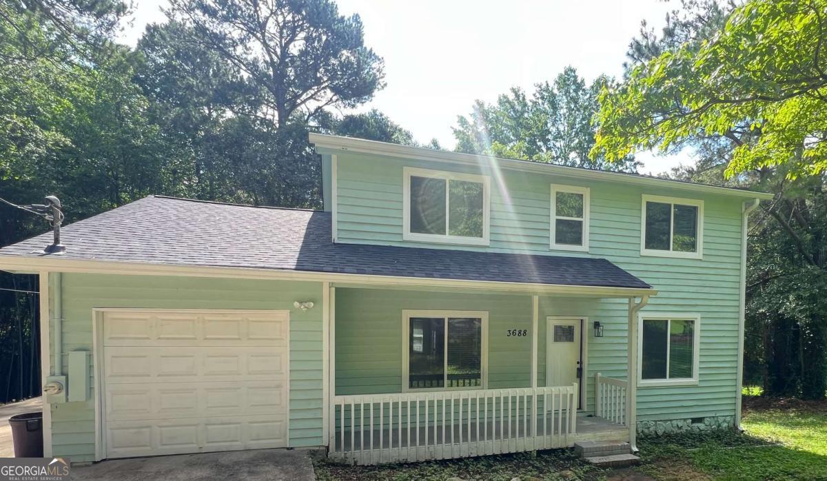 Please review the details of this beautifully renovated home now available for rent in Lithonia, GA. This spacious residence, located in the desirable Burlington neighborhood, features three bedrooms and two and a half bathrooms, making it ideal for both family living and entertaining with its modern finishes and open-concept layout. Key highlights of this home include a brand-new kitchen with sleek granite countertops, new stainless steel appliances, and ample cabinetry. The bathrooms have been updated with stylish tile work and contemporary fixtures. The entire home features fresh paint and vinyl flooring throughout, creating an inviting atmosphere. Additionally, the property boasts a large deck partially covered allowing you to have a view of the backyard, unique bamboo landscaping, and a screened-in porch, perfect for outdoor relaxation or entertaining. The home also offers convenience with easy access to major highways, shopping, dining, and schools, and comes equipped with a new HVAC system, all new windows, and a brand-new water heater. This move-in ready home presents an excellent opportunity. Schedule a showing today to experience it firsthand.