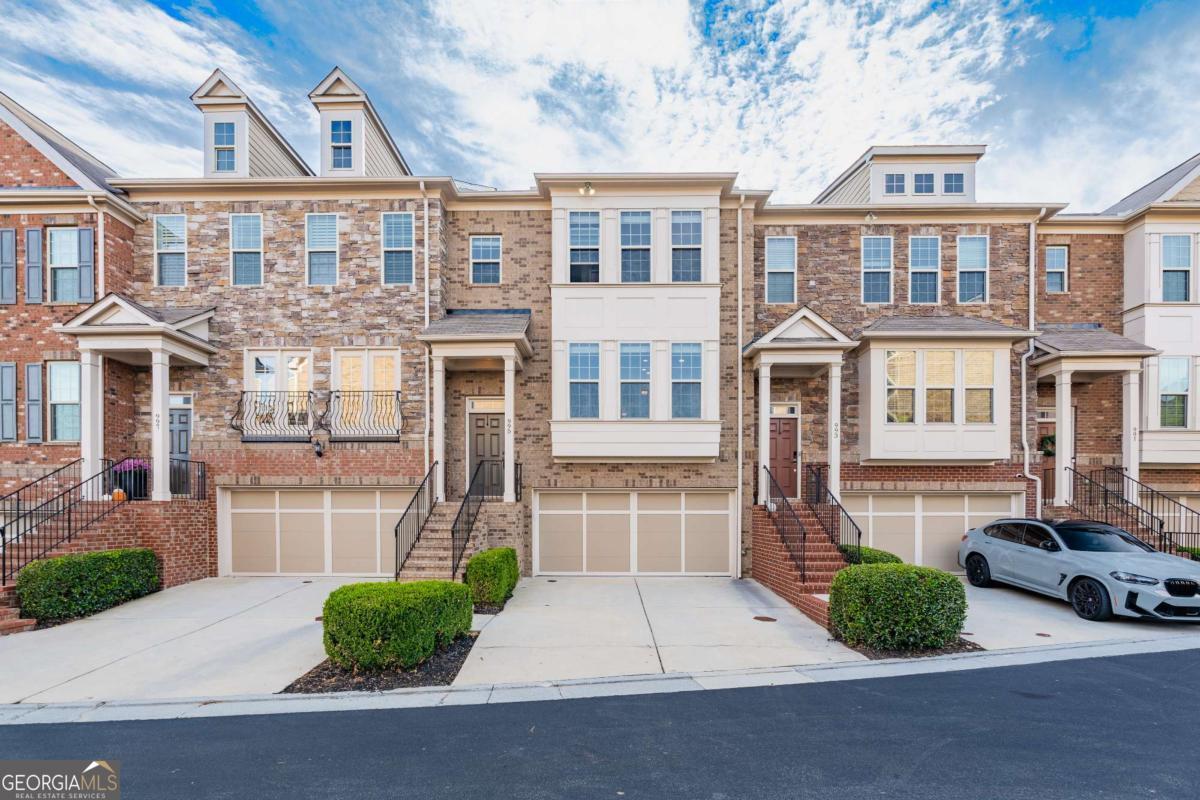 Exquisite 4 bedroom 3.5 bath home located in the quiet gated community Buckhead Park at Lenox of Atlanta! This beautiful home features an open and bright floor plan with tons of natural light and fantastic views. The large family room features a grand stone fireplace and hardwood floors. The kitchen has beautifully cherry-stained cabinets, stone countertops, and stainless appliances with an island. The master has a double-trayed ceiling with a sitting room. The master bath features double vanities with stone counters, a glass-enclosed walk-in shower, a large soaking tub, and walk-in closet. The secondary bedrooms are spacious and bright. There are covered porches on each of the 3 levels giving you great views and privacy to enjoy the outdoors. This home has everything you need plus easy access to major highways! Great Schools!