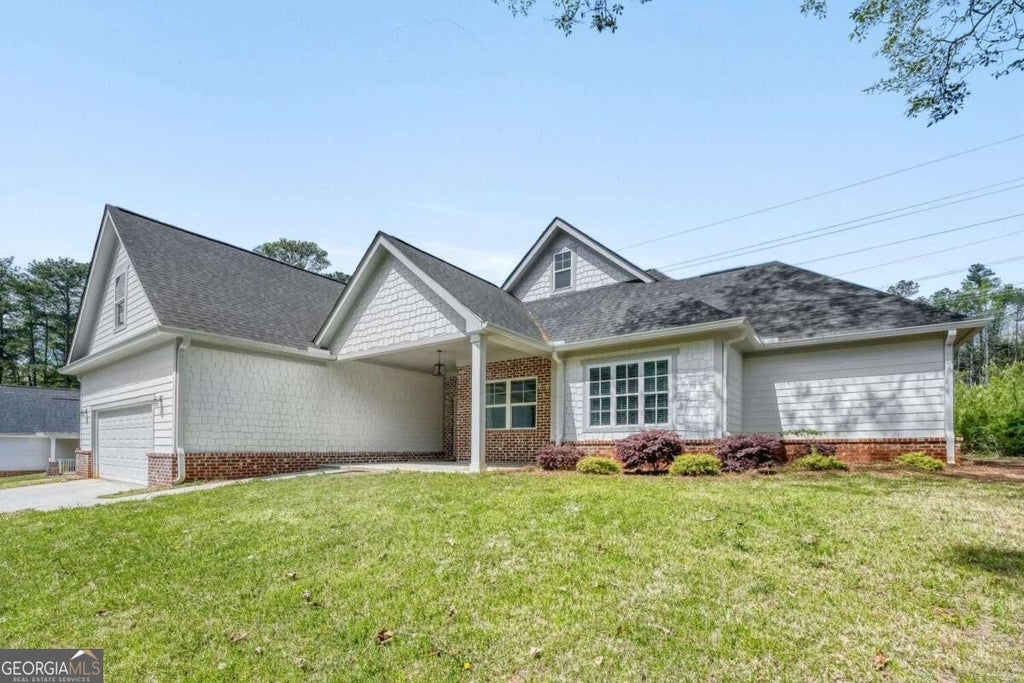 Photo of 740 Poplar Springs Road, Powder Springs, GA 30127 (MLS # 10869702)