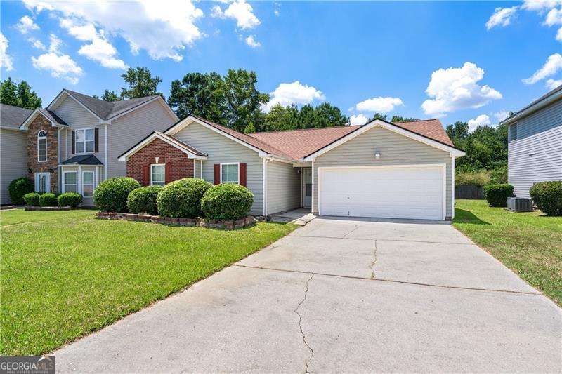 Welcome Home! Spacious 3-bedroom, 2-bath. This spacious home features an open floor plan with cathedral ceilings and a large eat-in kitchen. The oversized master suite includes tray ceilings, a walk-in closet, and a private bath. Enjoy a huge level backyard, perfect for relaxing or entertaining. New roof (2024 - 7 months old), Water heater replaced in 2023, HVAC serviced in 2024. Conveniently located near shopping, restaurants, Interstate 85, and less than 18 minutes from the airport, this home offers the perfect blend of suburban tranquility and urban accessibility. Plus, with no rental restrictions, it's an excellent investment opportunity. Don't miss out on this fantastic chance to make this stunning home your own. Schedule a viewing today. Move-in ready!