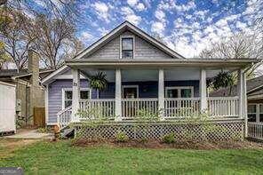 Situated in the heart of Kirkwood - Just a short walk to Bessie Branham Park and all that Kirkwood Village has to offer! - This renovated 1930's bungalow will win your heart from the welcoming front porch and appeal to your sensibility with 4 bedrooms and 3.5 bathrooms! The light-filled floor plan flows seamlessly from the living room, family room, and expansive kitchen onto the screened back porch overlooking the fenced backyard, making it perfect for enjoying beautiful Atlanta seasons. The main level features a primary suite, plus 2 additional bedrooms separated by a hall bath. Upstairs is a large suite perfect for a teen, inlaw or guests and it has a bright and cheery office or reading nook area too! Ask about the assumable loan option at 3.125%!