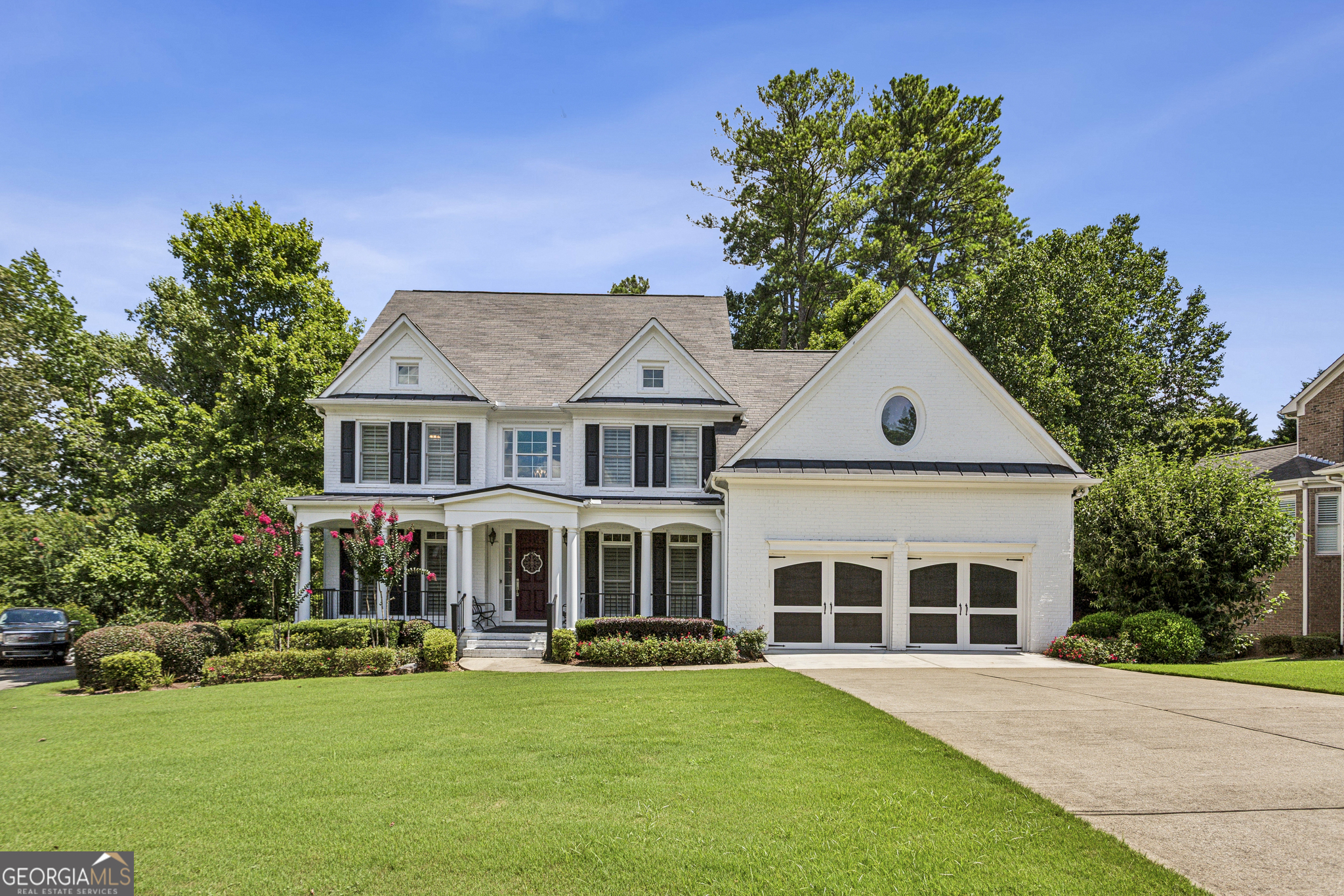 Welcome to this beautifully renovated 5-bedroom, 4.5 bath single-family home nestled in the prestigious Woodmont Golf and Country Club in Canton, GA. Offering the perfect blend of luxury, functionality, and serene outdoor living, this home is move-in ready and packed with upgrades. Formal living and dining rooms to tastefully accomodate all your guests. Step inside to discover a fully updated kitchen featuring premium finished, high end stainless steel appliances and white custom cabinetry-ideal for everyday living and entertaining. The spacious master suite with sitting area includes a luxuriously renovated en-suite bath with designer stand alone tub designed for relaxation and style. Ample room for all your wardrobe in the oversized master closet. A large bonus room provides the perfect flex space for a media room, playroom, excercise room or home office. The daylight basement includes a finished in-law suite complete with a kitchenette and private entrance for guests or multigenerational living. The expansive basement also includes a special childrens playroom, designed by the owners artistry to make you feel like your at Disney World, and additional storage space. Enjoy the outdoors from the screened porches, deck or the under decking patio, all overlooking a large, fenced wooded backyard with private trails-a nature lover's dream. Located on a quiet street within the vibrant Woodmont community, this home offers access to top-notch amenities including golf, swim, tennis and clubhouse. All within a short drive to shopping, dining and top-rated schools. Don't miss this rare opportunity to own a renovated gem in one of Canton's most sought after neighborhoods!