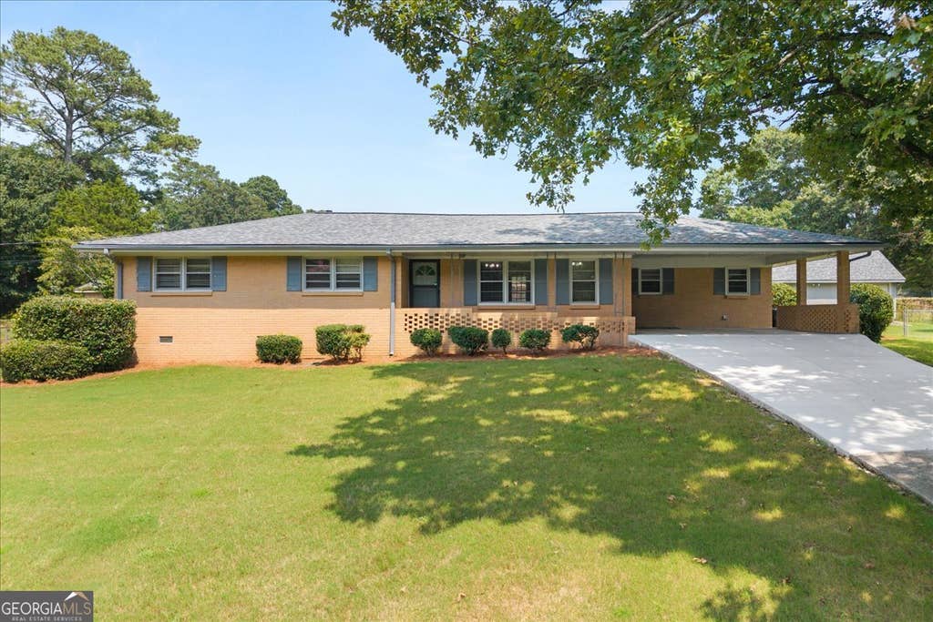 Photo of 454 Hilltop Road SW, Conyers, GA 30094 (MLS # 10815708)