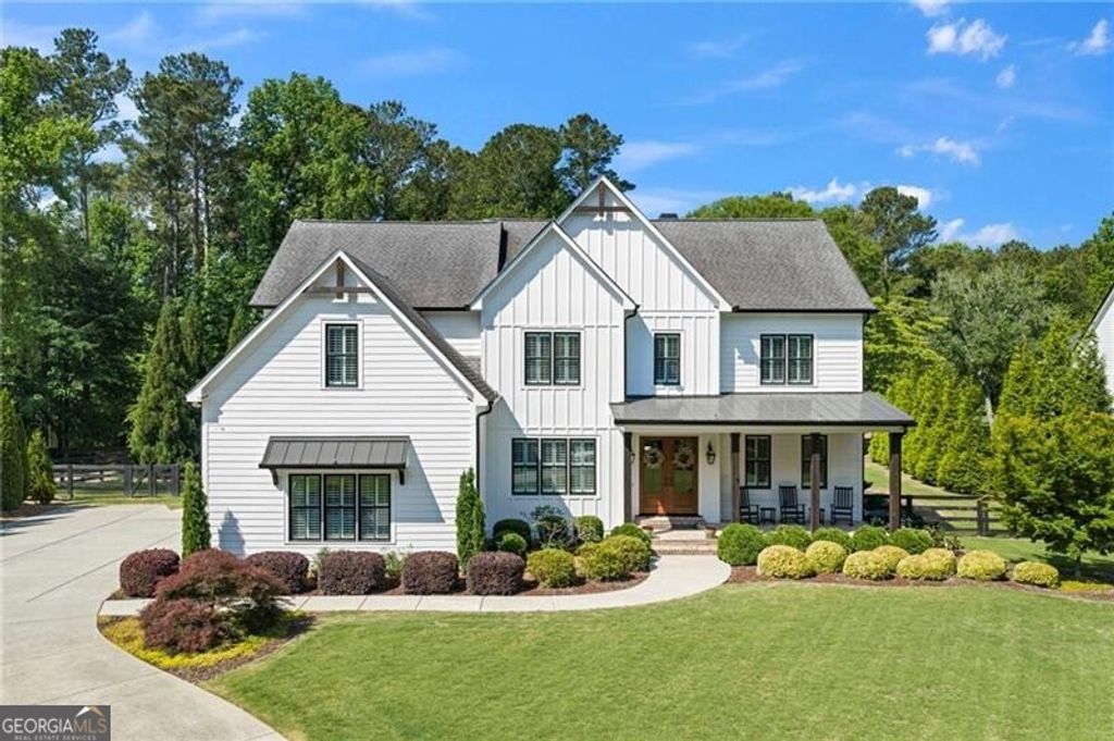 Photo of 14200 Cogburn Road, Milton, GA 30004 (MLS # 10767381)