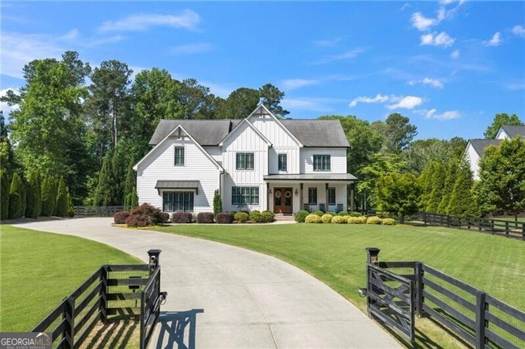 Photo of 14200 Cogburn Road, Milton, GA 30004 (MLS # 10767381)