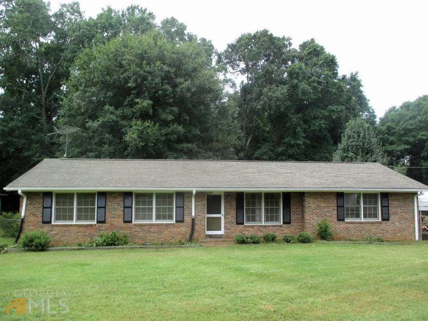 Four sided Brick ranch with  3 bedrooms and 2 full baths on very generous acreage with a totally fenced backyard, located in the charming city of Bowman. The house has an attached 2 car carport plus a detached 2 car carport. There is plenty of room in the backyard for gardening, backyard games, and grilling with family and friends. All of this and at a very attractive price. Call today and let me show you your new home.