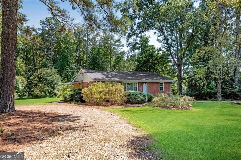 Photo of 3740 Post Oak Tritt Road, Marietta, GA 30062 (MLS # 10843464)