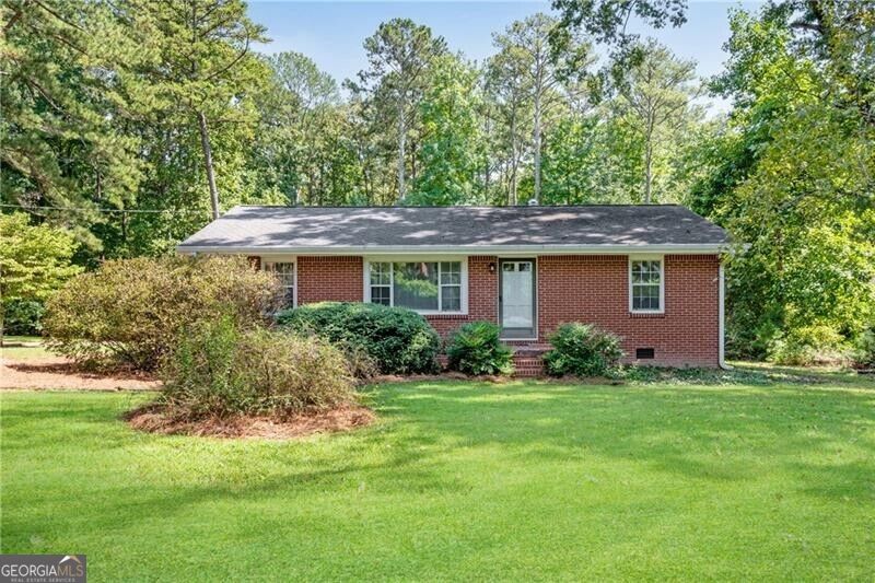 Photo of 3740 Post Oak Tritt Road, Marietta, GA 30062 (MLS # 10843464)